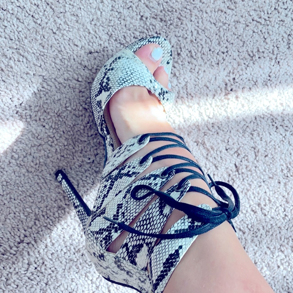 Snakeskin tie up heels